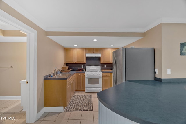 5 Carriage Ct, Johnson City, TN 37604 - kitchen featuring white range with gas cooktop, freestanding refrigerator, under cabinet range hood, a sink, and light tile patterned flooring