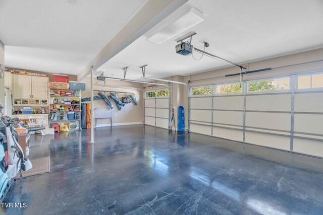 5 Carriage Ct, Johnson City, TN 37604 - garage with a garage door opener and baseboards