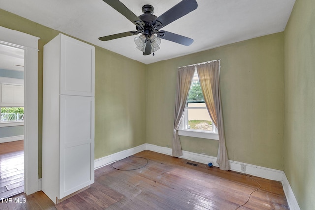 1217 Kentucky Ave, Bristol, TN 37620 - unfurnished room featuring wood finished floors, baseboards, and ceiling fan