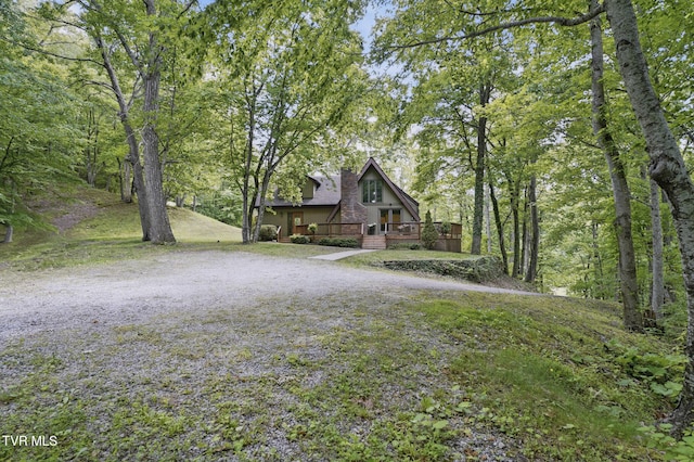 8466 Courtland Rd, Wise, VA 24293 - view of front of house featuring a deck, driveway, and a chimney