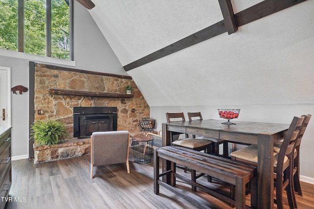 8466 Courtland Rd, Wise, VA 24293 - dining area featuring wood finished floors, a textured ceiling, and baseboards
