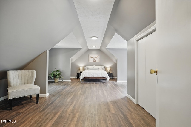 8466 Courtland Rd, Wise, VA 24293 - bedroom featuring wood finished floors, vaulted ceiling, and baseboards
