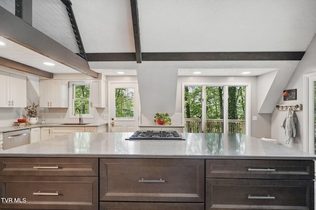 8466 Courtland Rd, Wise, VA 24293 - kitchen with a sink, white cabinets, stainless steel appliances, light stone counters, and beam ceiling