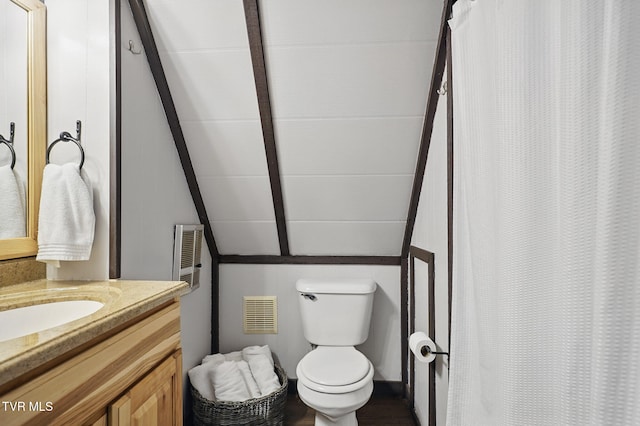 8466 Courtland Rd, Wise, VA 24293 - full bath with lofted ceiling, toilet, vanity, and a shower with curtain