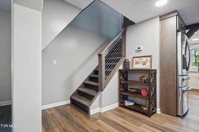 8466 Courtland Rd, Wise, VA 24293 - staircase featuring wood finished floors and baseboards