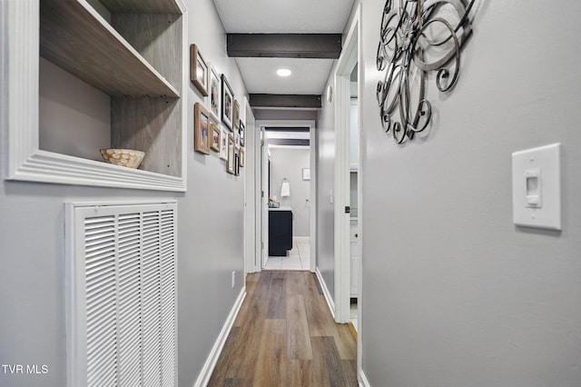8466 Courtland Rd, Wise, VA 24293 - hallway with wood finished floors, baseboards, and a heating unit