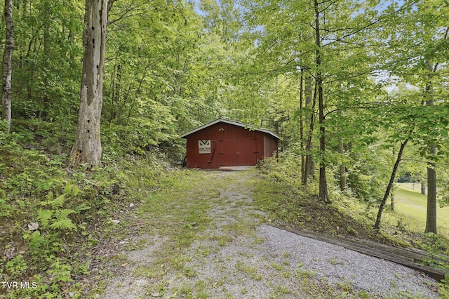 8466 Courtland Rd, Wise, VA 24293 - view of yard with an outbuilding and a wooded view