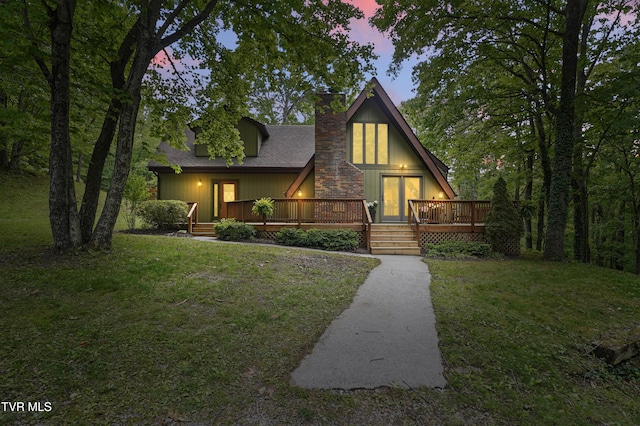 8466 Courtland Rd, Wise, VA 24293 - a-frame home with a chimney, a lawn, a wooden deck, and a shingled roof