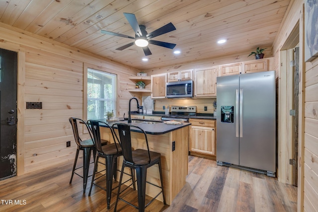 455 Okey Mowell Rd, Kingsport, TN 37660 - kitchen with stainless steel appliances, dark countertops, wood ceiling, light brown cabinetry, and light wood-type flooring