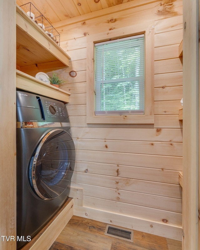 455 Okey Mowell Rd, Kingsport, TN 37660 - laundry room with washer / dryer, wood finished floors, and wood walls