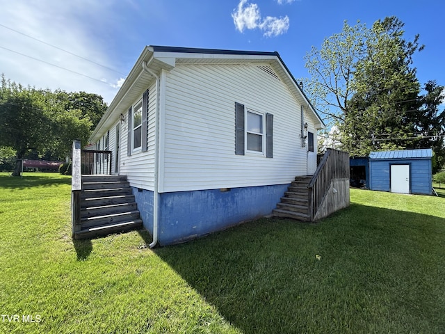 12139 Driffield Dr, Coeburn, VA 24230 - view of side of property with stairway, crawl space, and a yard