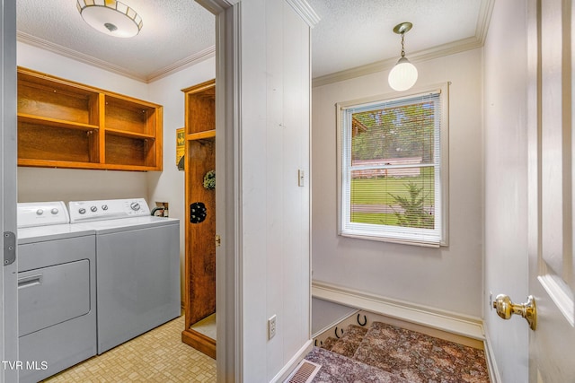1605 Ryder Church Rd, Bluff City, TN 37618 - laundry area with washer and clothes dryer, a textured ceiling, crown molding, and light floors