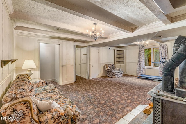 1605 Ryder Church Rd, Bluff City, TN 37618 - living area featuring a chandelier, carpet, crown molding, and beam ceiling