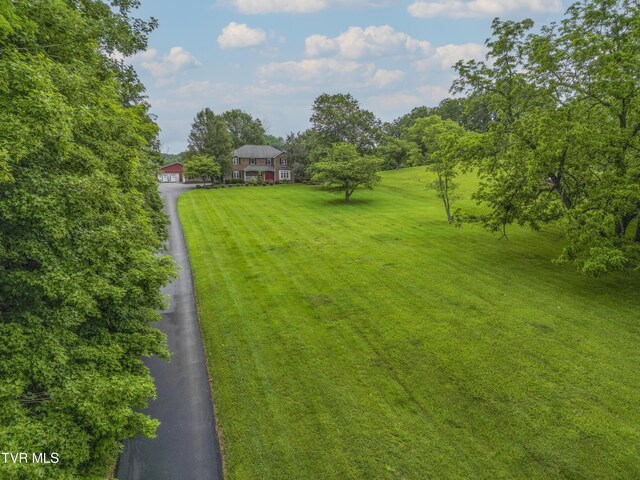 22319 Campground Rd, Bristol, VA 24202 - view of green lawn featuring asphalt driveway