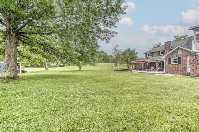 22319 Campground Rd, Bristol, VA 24202 - view of green lawn featuring a patio area