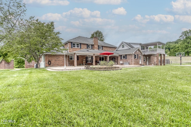 22319 Campground Rd, Bristol, VA 24202 - view of front of home featuring brick siding, a balcony, a patio, and a chimney
