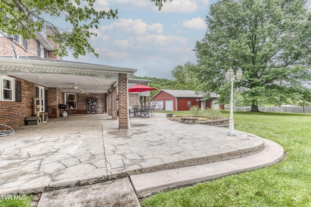22319 Campground Rd, Bristol, VA 24202 - view of patio / terrace featuring an outdoor structure, a ceiling fan, and outdoor dining area