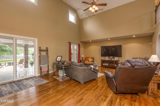 22319 Campground Rd, Bristol, VA 24202 - living area with high vaulted ceiling, ceiling fan, light wood-style floors, and baseboards