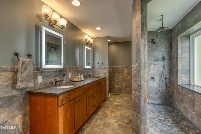 22319 Campground Rd, Bristol, VA 24202 - bathroom featuring tile walls, double vanity, walk in shower, and a wainscoted wall