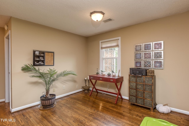 22319 Campground Rd, Bristol, VA 24202 - miscellaneous room featuring wood finished floors, baseboards, and a textured ceiling