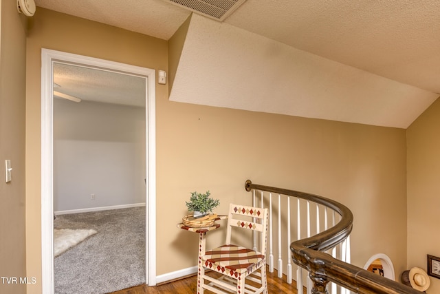 22319 Campground Rd, Bristol, VA 24202 - hall with a textured ceiling, wood finished floors, and baseboards