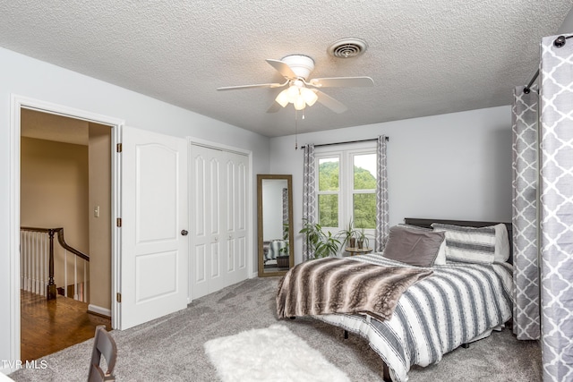 22319 Campground Rd, Bristol, VA 24202 - carpeted bedroom with a closet, a ceiling fan, and a textured ceiling