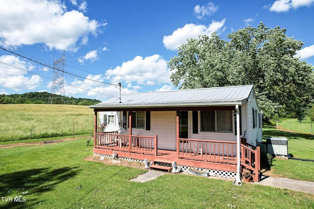 1730 Baileyton Main St, Greeneville, TN 37745 - ranch-style home featuring a front yard, metal roof, and covered porch