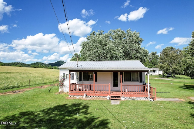 1730 Baileyton Main St, Greeneville, TN 37745 - view of front of home featuring a front lawn, metal roof, and a porch