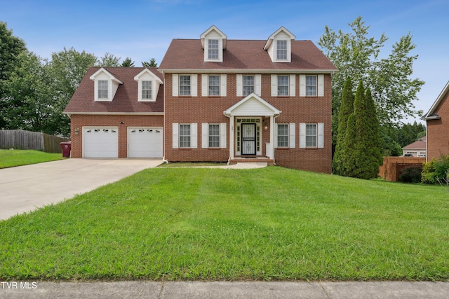 1402 Lake Ridge Sq, Johnson City, TN 37601 - view of front of home featuring driveway, brick siding, and a garage