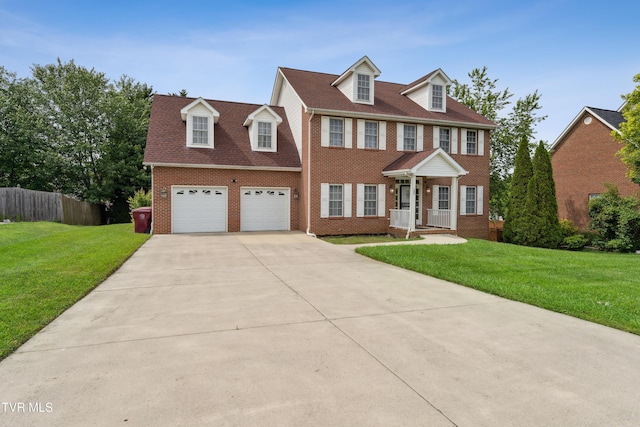 1402 Lake Ridge Sq, Johnson City, TN 37601 - view of front of house featuring brick siding, driveway, and a garage