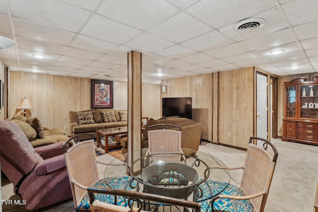 1402 Lake Ridge Sq, Johnson City, TN 37601 - living area with wood walls, a drop ceiling, light carpet, and baseboards