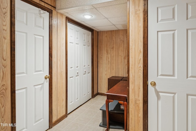 1402 Lake Ridge Sq, Johnson City, TN 37601 - hall featuring wooden walls, a drop ceiling, and light tile patterned floors