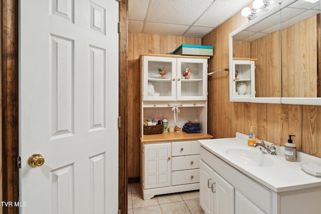 1402 Lake Ridge Sq, Johnson City, TN 37601 - bathroom featuring wooden walls, tile patterned flooring, vanity, and a drop ceiling