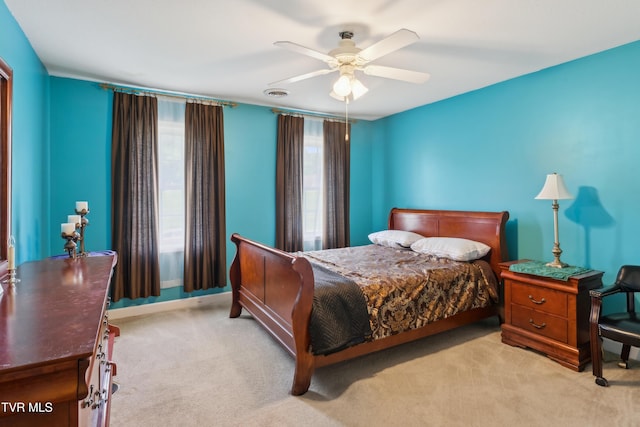 1402 Lake Ridge Sq, Johnson City, TN 37601 - carpeted bedroom with multiple windows, a ceiling fan, and baseboards