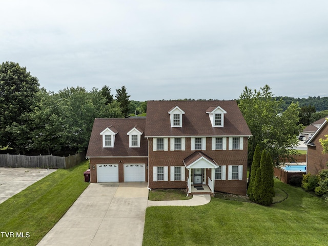 1402 Lake Ridge Sq, Johnson City, TN 37601 - colonial inspired home with brick siding and concrete driveway
