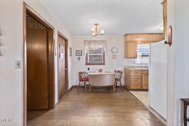 313 Peach Blossom Ct, Johnson City, TN 37604 - dining room featuring ornamental molding, a chandelier, and light wood-type flooring