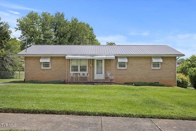 313 Peach Blossom Ct, Johnson City, TN 37604 - single story home with metal roof and brick siding