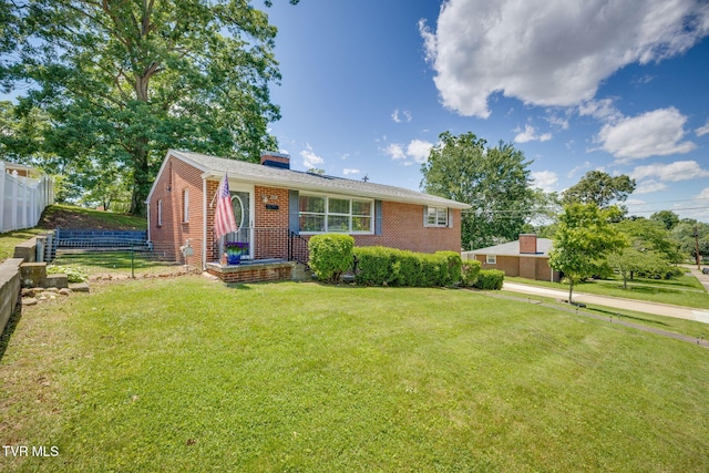 2228 Bruce St, Kingsport, TN 37664 - view of front of house featuring brick siding and a chimney