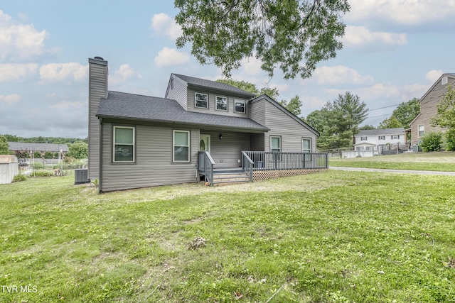 5 Loire Ct, Johnson City, TN 37604 - bungalow-style home with a chimney, a front lawn, cooling unit, a wooden deck, and a shingled roof