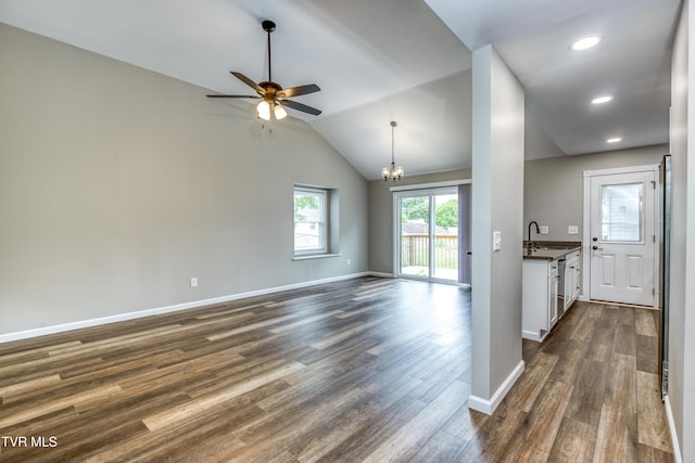 5 Loire Ct, Johnson City, TN 37604 - unfurnished living room featuring a sink, a chandelier, dark wood-style floors, a ceiling fan, and vaulted ceiling