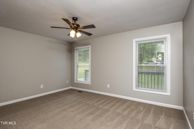 5 Loire Ct, Johnson City, TN 37604 - spare room with baseboards, carpet flooring, and a ceiling fan