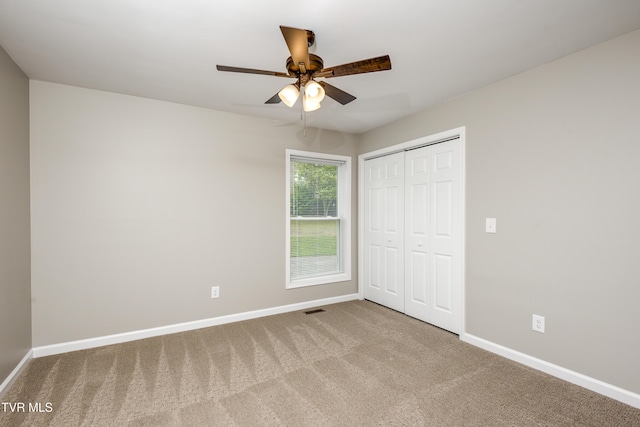 5 Loire Ct, Johnson City, TN 37604 - unfurnished bedroom with carpet floors, baseboards, a closet, and a ceiling fan