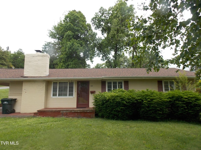 167 Cherry Ln, Bristol, VA 24201 - ranch-style home with a front lawn and a chimney