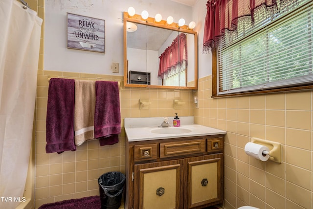 293 Miller Rd, Jonesborough, TN 37659 - bathroom featuring tile walls, vanity, and a shower with shower curtain