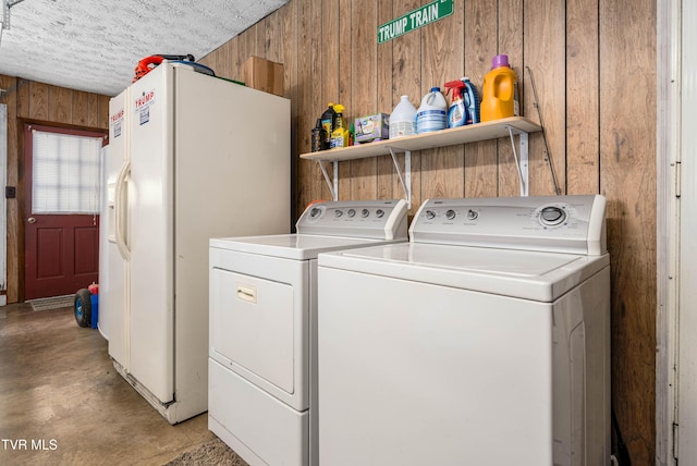 293 Miller Rd, Jonesborough, TN 37659 - laundry room featuring wood walls and separate washer and dryer