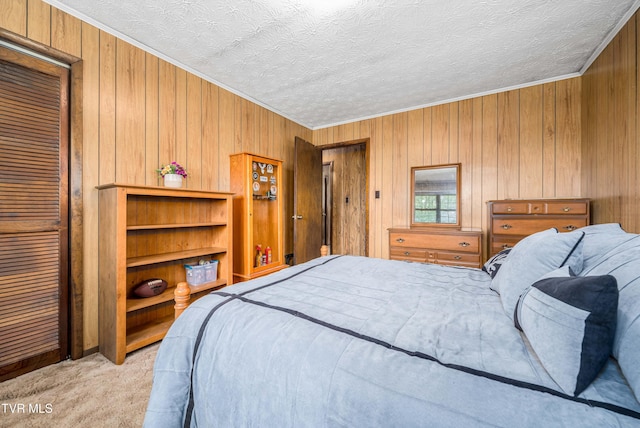 293 Miller Rd, Jonesborough, TN 37659 - bedroom with ornamental molding, wood walls, light colored carpet, and a textured ceiling