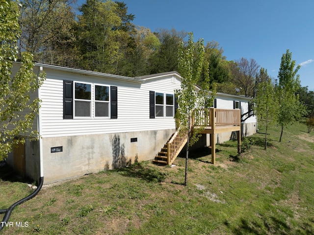 123 Griffin Dr, Dandridge, TN 37725 - rear view of house with stairway, a wooden deck, a yard, and crawl space