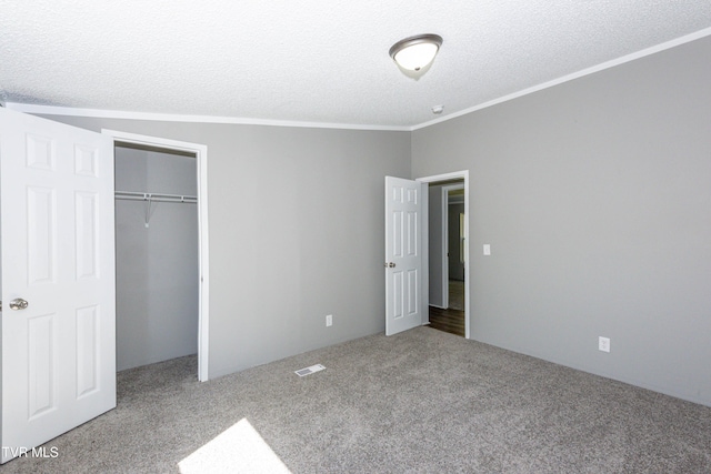 123 Griffin Dr, Dandridge, TN 37725 - unfurnished bedroom featuring carpet floors, crown molding, a textured ceiling, and a closet