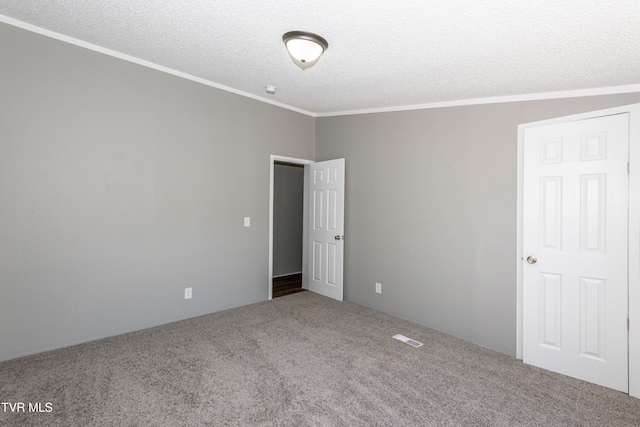 123 Griffin Dr, Dandridge, TN 37725 - spare room featuring carpet, crown molding, and a textured ceiling