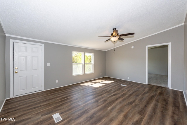 123 Griffin Dr, Dandridge, TN 37725 - unfurnished living room with crown molding, ceiling fan, dark wood finished floors, a textured ceiling, and vaulted ceiling